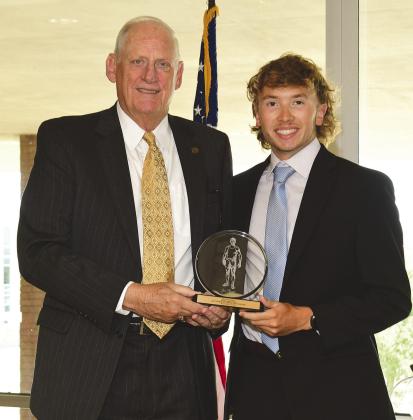 Meeker’s Riley Randall was presented the Jim Thorpe Male Cross Country Runner award from the Oklahoma Sports Hall of Fame. A three-time state champion in cross country, Randall was one of 17 athletes from across the state recognized for their outstanding work and achievements. He was on the Meeker High School Bulldogs cross country team, coached by Antony Earley. Riley graduated in May and will attend Oklahoma City University, where he will run cross country and track.