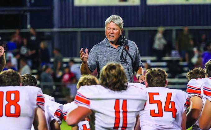 Davenport coach Johin Greenfield talks with his team Friday night after their win at Southwest Covenant. Photo/Mario Holland