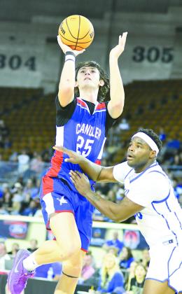 The Lions’ Jake Smithey (25) puts up a one-hander in the second half against Sequoyah-Claremore. Photo/Brian Blansett