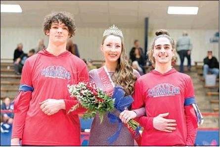 The Lions crowned Morgan Fowble, left, as basketball Homecoming queen Friday night and Caroline Pepper,
