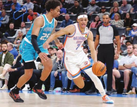 Oklahoma City Thunder forward Darius Bazley (7) drives to the basket as Charlotte Hornets forward P.J. Washington (25) defends during the second half at Paycom Center. Charlotte won 134-116. (Alonzo Adams-USA TODAY Sports)