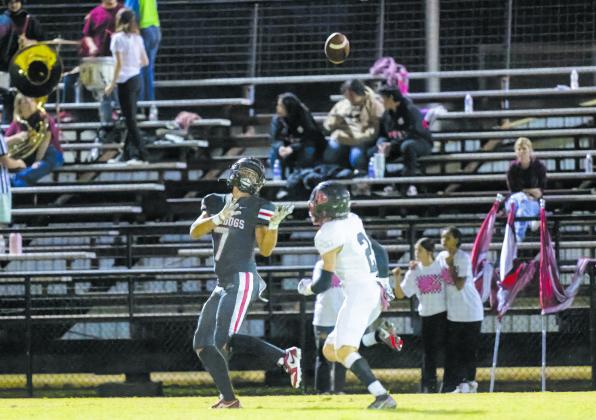 Logan Devereaux gets behind the Luther defender for a long gain in the Bulldogs’ win Friday night. The victory lifted Meeker to a 3-2 record in district and gave them a big leg up for the playoffs. If the Dogs win one of their final two games, they’ll be in the playoffs. If that win is against Crossings Friday night, they probably will finish third and play the second-place team from District 2A-1 on the round in the first round. Photo/Rick Hester