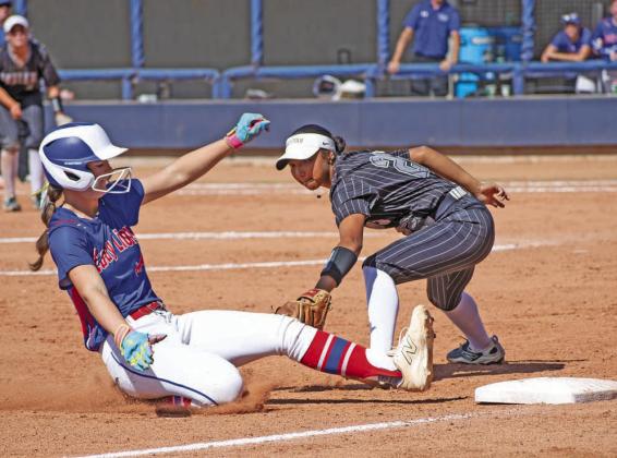 Halle Herrmann slides in safely with a triple against Sequoyah-Tahlequah. Photo/Brian Blansett