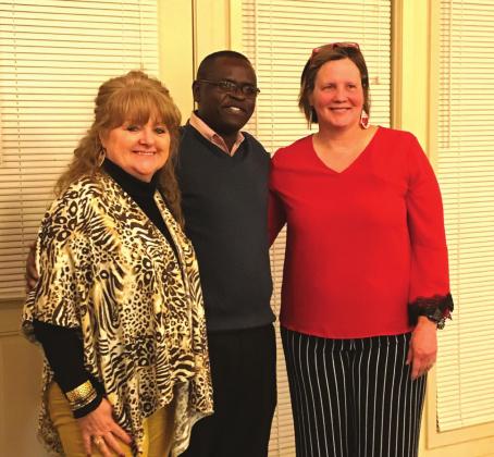 Pictured above from left to right, Pam Hunt, Pastor Gerard Nsabimana and Kim Johnson at the Beta Sigma Phi meeting hosted by Hunt and Johnson. Photo/submitted
