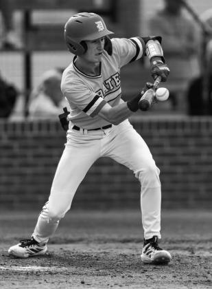 Above, Stroud senior Jessen Leathers slide home safely in a cloud of dust last week against Hinton. Photo/Beth Young Left, Dale’s Chase Harris lays down a bunt that earns him first base against Newcastle. Photo/Rick Hester Right, Tyler Bergsten from North Rock Creek delivers a pitch in regional action against Eufaula. Photo/Sheryl Gowin