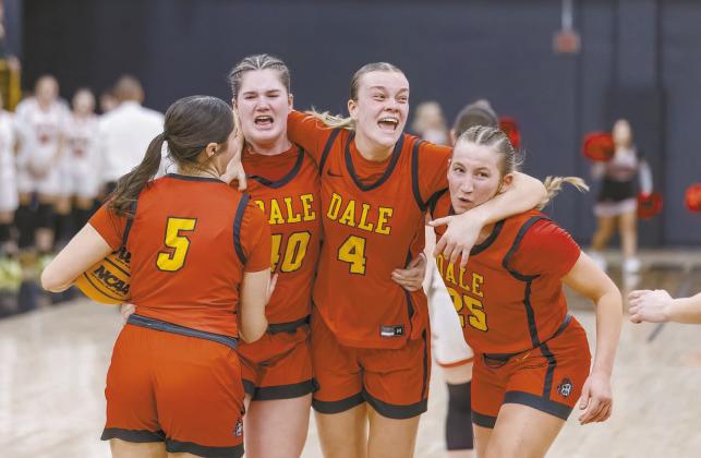 Dale’s Ava Bell (4) leads a spontaneous postgame celebration with Kynlee Bullard (5), Danika Pendley (40), and Teague Muncy (25) after the Lady Lions secured a berth in the state tournament by winning their area tournament. Photo/Rick Hester