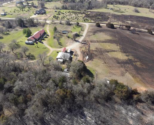 Wildfires across Lincoln County last Friday scorched several hundred acres. Above and above right are photos of the Bell Cow Creek Fire near Bell Cow Lake that burned 285 acres, destroyed a barn and an outbuilding. Emergency Management Director Cody McDonell said 13 fires occurred across the county with this fire and the Sandy Creek Fire near Tryon that burned 101 acres being the most significant ones. Photos provided by Cody McDonell.