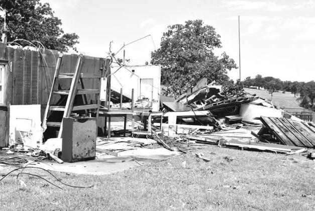 Some walls of the building at the Chandler Baseball Camp remain after the storms. Photo/Emily Kalka