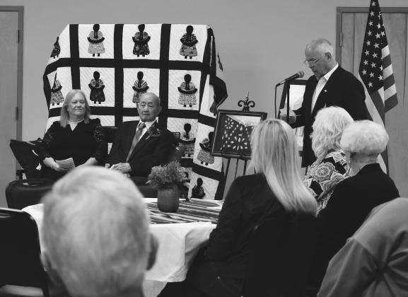 Dr. George Conrad Markert, seated next to his wife Ladonna, is honored by Ed Dyer, CEO of Stroud Regional Medical Center, at Stroud First Baptist Church on Nov. 10. Dr. Markert, 94, has served the community of Stroud for about 59 years and was awarded the first Heroes in Healthcare Award by Avem Healthcare Partners and Stroud Community Foundation. Photo/Emily Kalka