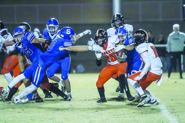 Jacob Beck and Trystan Baker bring down a Fairview ballcarrier. Also picrtured for Stroud are Stetson Bunyard and Kyle Guest. Photo/Mario Holland