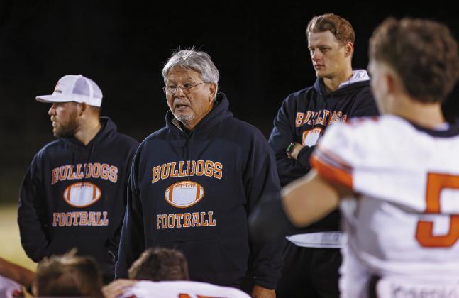 Davenport coach John Greenfield talks to the team after the game against Wilson Friday night. Photo/Rick Hester