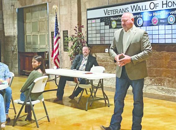 State Rep. Kevin Wallace speaks to a group of about 30 people at the legislative forum at the Route 66 Interpretive Center in Chandler last week. At the table is state Sen. Grant Green, who also addressed the crowd and answered questions. Photo/Elizabeth Golliver