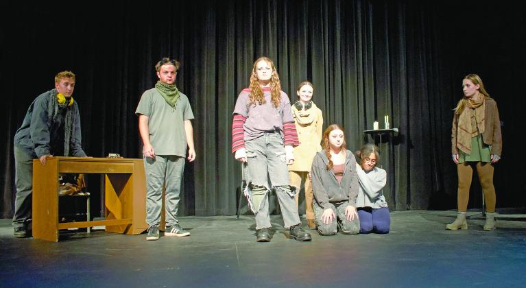 The cast of “In Darkness, Audio Flowers Bloom” prepares to make audio flowers on stage at the preview of the one-act on Thursday, Sept. 25, at the Performing Arts Center at Chandler High School. From left to right are James Kerr, Weston Miller, Bethany Descher, Mae Solomon, Cabella Reno, Zayli Jackson and Hannah Davis. Photo/Emily Kalka