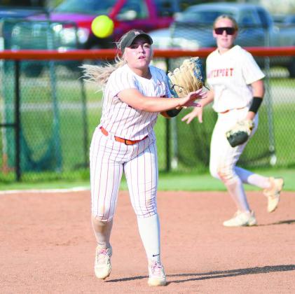 Senior Landry Miller throws to first for an out against Maud. Photo/Brian Blansett