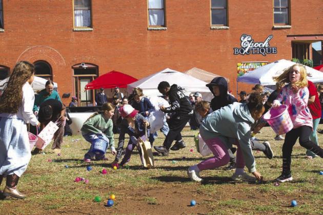 Pandemonium ensued on the courthouse lawn in Chandler on April 4, as the city held its annual Easter egg hunt. Dozens of children showed up ready to collect as many eggs as they could, with the hunt lasting a grand total of about three to five minutes. Hundreds of eggs were spread out across the lawn, contain sweet treats for the kiddos. Photo/Emily Kalka