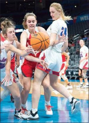 Below left, Brannon and Selah Bryan (24) contend with Lexie Boyer for a loose ball. For more photos from the game, check out the slideshow at: https://www.lcnok.com/sports/chandler-vs-mcloud-chesapeake