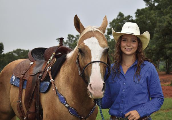 Kenzie Cowden and Peaches. Photo/Emily Kalka