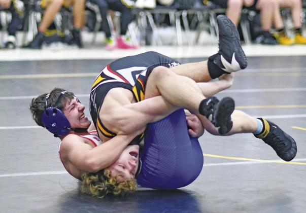 Chandler’s boys and girls wrestling teams have their seasons in full swing and will be back in action Jan. 3 when they host Oklahoma Christian School. Pictured in white at their recent dual in Tecumseh are, clockwise from the top, Joshua Baugher, Preston Sowder, Easton Manning, Justice Snovel, Nelly Barton and Chace Massie. Photos/Brian Blansett