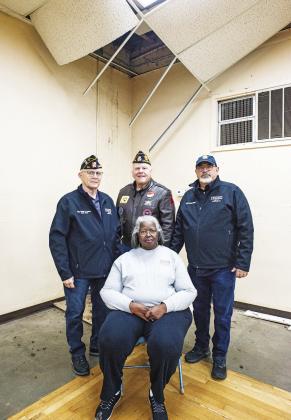 Members of the American Legion and American Legion Auxiliary pose in their building, known as The Hut. The groups face a crossroads as they decide how to proceed with the historic building that has been a Chandler mainstay for over eight decades. Picture are Nellie Caldwell (seated) and (standing, left to right) Walter Hughey, George Hicks and Kirk Holloway. Photo/Brian Blansett