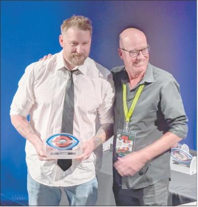 Right, filmmaker, writer and actor Adam Hampton receives his Icon Award at the deadCenter Film Festival awards ceremony on Saturday night in Oklahoma City. Photo/Jennifer Pryor