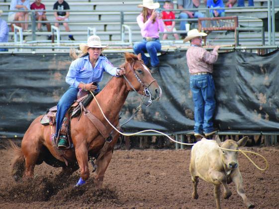 Above, steer wrestler Dally Trussell from McLoud makes a move on his steer during the Tuesday morning session at the International FinalsYouth Rodeo in Shawnee. Photo/Brian Blansett. Below, Emma Helmick competes in the break-away roping on Monday. Photo/Jentezen Smith. Below right, Audrey Fish from Wellston goes in the Tuesday morning session. Photo/Jentezen Smith. The rodeo continues through Saturday at the Expo in Shawnee.w