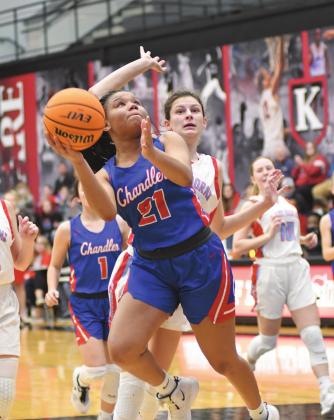 Jaelynn Robertson (21) puts up a shot in the lane during Chandler’s regionals finals matchup with Chisholm Saturday night. Photo/Brian Blansett