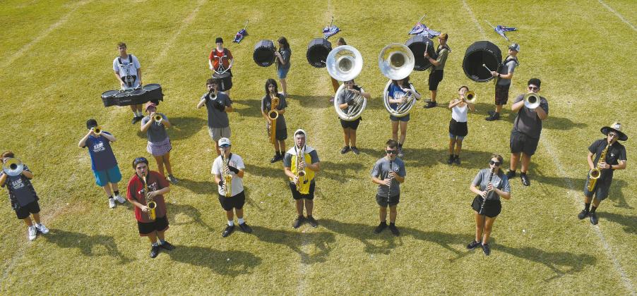 Photo/Emily Kalka The Pride of Chandler marching band prepares its new program - “The Ballad of Georgia Graves” - on the final day of their band camp on Aug. 8. Later that day, the band held a public preview for friends and family later that afternoon.