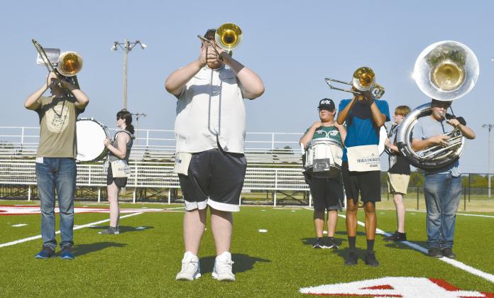 The Prague marching band works through sets for their "World of Warcraft" program for this year's season on Aug. 7 on the football field. Prague's first football home will be on Sept. 12 versus North Rock Creek, and the band should perform at halftime. Photo/Emily Kalka