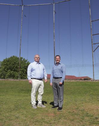 Chandler Mayor Kent McVey and City Manager Jason Orr stand on the baseball field near Rt. 66 Interpretive Center, where a new park will be built. The city was awarded a $650,000 Rt. 66 grant for the project, which will be baseball-themed. It is set to be completed before the Rt. 66 Centennial Celebration in 2026. Photo/Emily Kalka