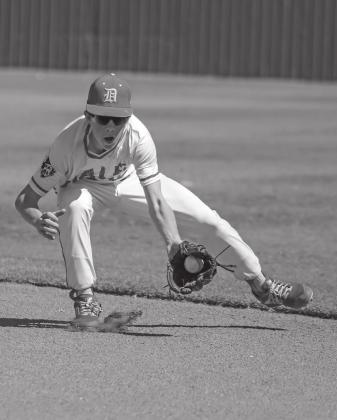 Easton Edmondson scoops up a grounder during Dale’s district tournament win over Calumet. Photo/Rick Hester
