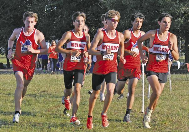 The lead group at the 66 Conference cross country meet last week included from left, Rhett Haley, Chandler (6808); Kendall Shawnee, McLoud (7154); Boyd Hamby, McLoud (7072); Mark O’Keefe, Chandler (6811) and Ryan Copeland, McLoud (7071). Photo/Shelley Haley