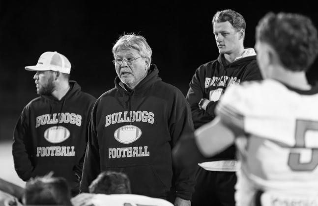 Coach John Greenfeld talks to his team after their final game of last season. Photo/Rick Hester