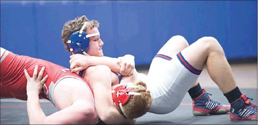 Chandler got several outstanding individual performances against Hinton, including Dalton Fowble, top, at 160 pounds; Chase Massie,