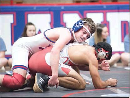 above left, at 138 pounds and Bo Barton,