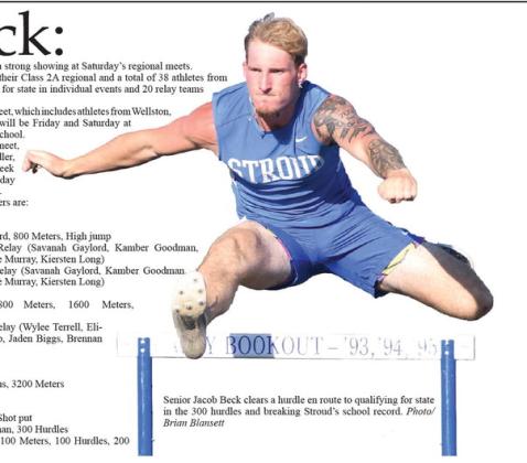Senior Jacob Beck clears a hurdle en route to qualifying for state in the 300 hurdles and breaking Stroud’s school record. Photo/ Brian Blansett