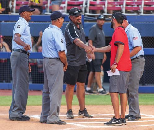 David Griffin, left, and Chance Griffin shake hands before the state finals Saturday nght. Photo/Rick Hester
