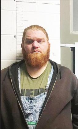 Four charged in homicide