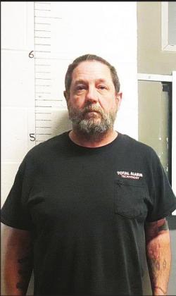 Four charged in homicide