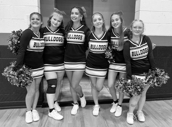 Brooklyn Allen, fourth from the left, with her teammates from the Carney cheer squad. Photo/Brian Blansett
