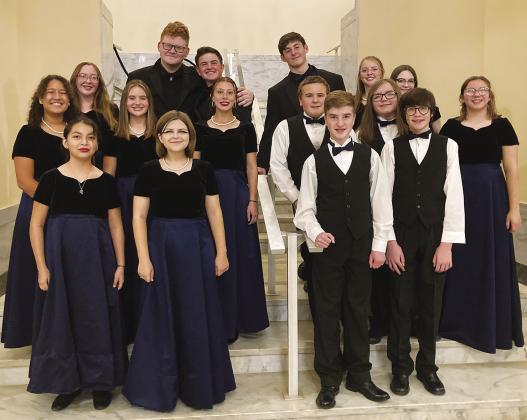 Chandler students celebrate after performing in the East Central Oklahoma Choir Directions Association Honor Choir at the Masonic Temple in Guthrie on Nov. 7. The students are as follows: Back row - Elizabeth Myers, Colton Burbach, Weston Miller, Eli Smithey, Allison Radcliffe &amp;amp; Mae Solomon; 2nd Row - Adrianna Rivera, Lily Milam, Julianna Stout, Dennis Rackley, Noah Davidson and Charleigh Cole; and 1st Row Aysia Wrenn, Madelyn Ledford, Colton Miller and Isaac Myers