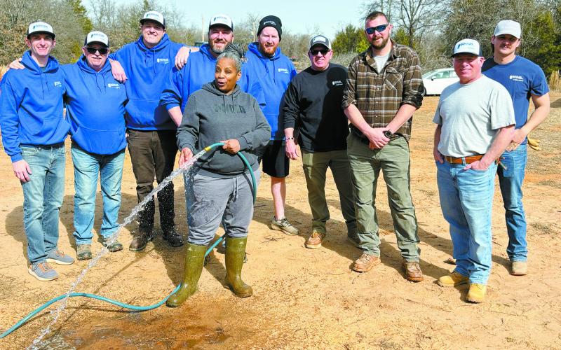 A team of volunteers from Lorman Well and Xylem Watermark worked to install a well for a family in Wellston so they could access clean and reliable water on Feb. 15. Photo/Xylem Watermark