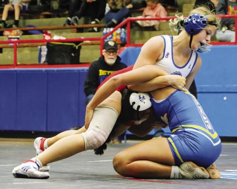 Chandler hosted Bethel in a wrestling dual last week. Working their opponents are (above) Lizzy Pryor, Brylee Waldman (left) and Brody Waldman (below). Photos/ Jennifer Pryor