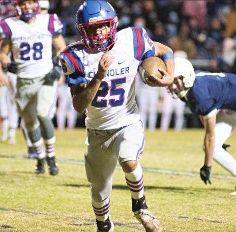 Chandler running back Casmen Hill breaks into the clear for part of his 210 yards on the night. Photo/Brian Blansett
