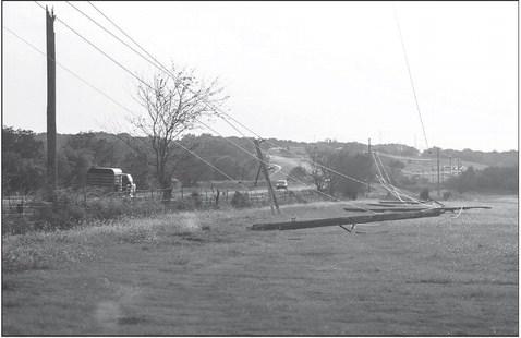 Downed power lines near Wellston caused by a surprise storm last week. Photo/Mario Holland