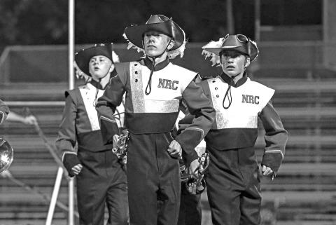 Austin Brown, Kypton Battershell and Logan Terrill from North Rock Creek High School perform during the finals at the Blue and Gold Marching Band Classic at Holdenvill on Sept. 26. Photo/Jennifer Pryor