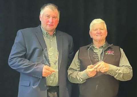 Matt Dornan accepts his awards for wheat he grows near Carney. Photo/Matt Dornana