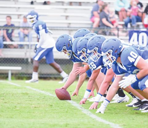 Stroud’s offensive line warms up prior to its scrimmage last week with Pawnee and Cashion. Photo/Brian Blansett