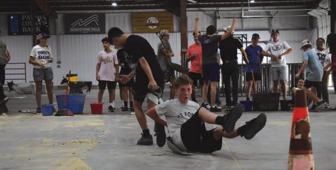 Bentley Powers pulls Nathan Drury during the Farmhand Olympics. Photo/Emily Kalka