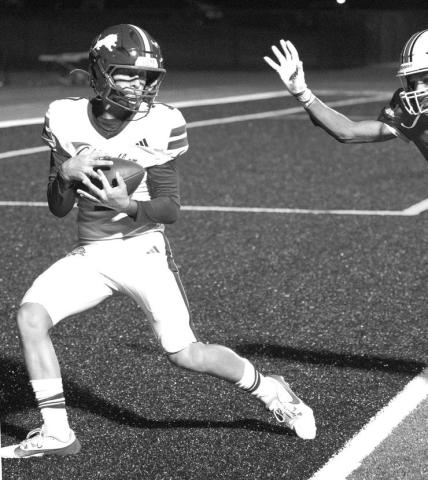 Bryson Taylor cradles the ball in the end zone after catching a touchdown pass Thursday. Photo/Brian Blansett