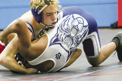 Chandler’s Landon Earp dominates his opponent during the Lions’ home dual against Star Spencer. Photo/Jennifer Pryor